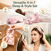 A collage showing a pink sleep and style set: a satin eye mask on a bed, a drawstring bag, a scrunchie, and a matching headband worn by a woman. Text reads 'Versatile 4-in-1 Sleep & Style Set' with callout icons for blocking light, promoting sleep, relieving fatigue, and travel readiness.